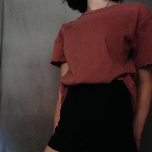 Dusty rose tee with distressed design on sleeves